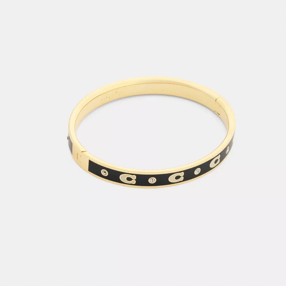 Armbånd med gentaget C-motiv og hængsel