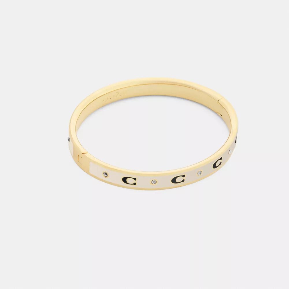 Armbånd med gentaget C-motiv og hængsel