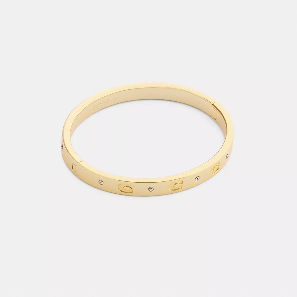 Armbånd med gentaget C-motiv og hængsel