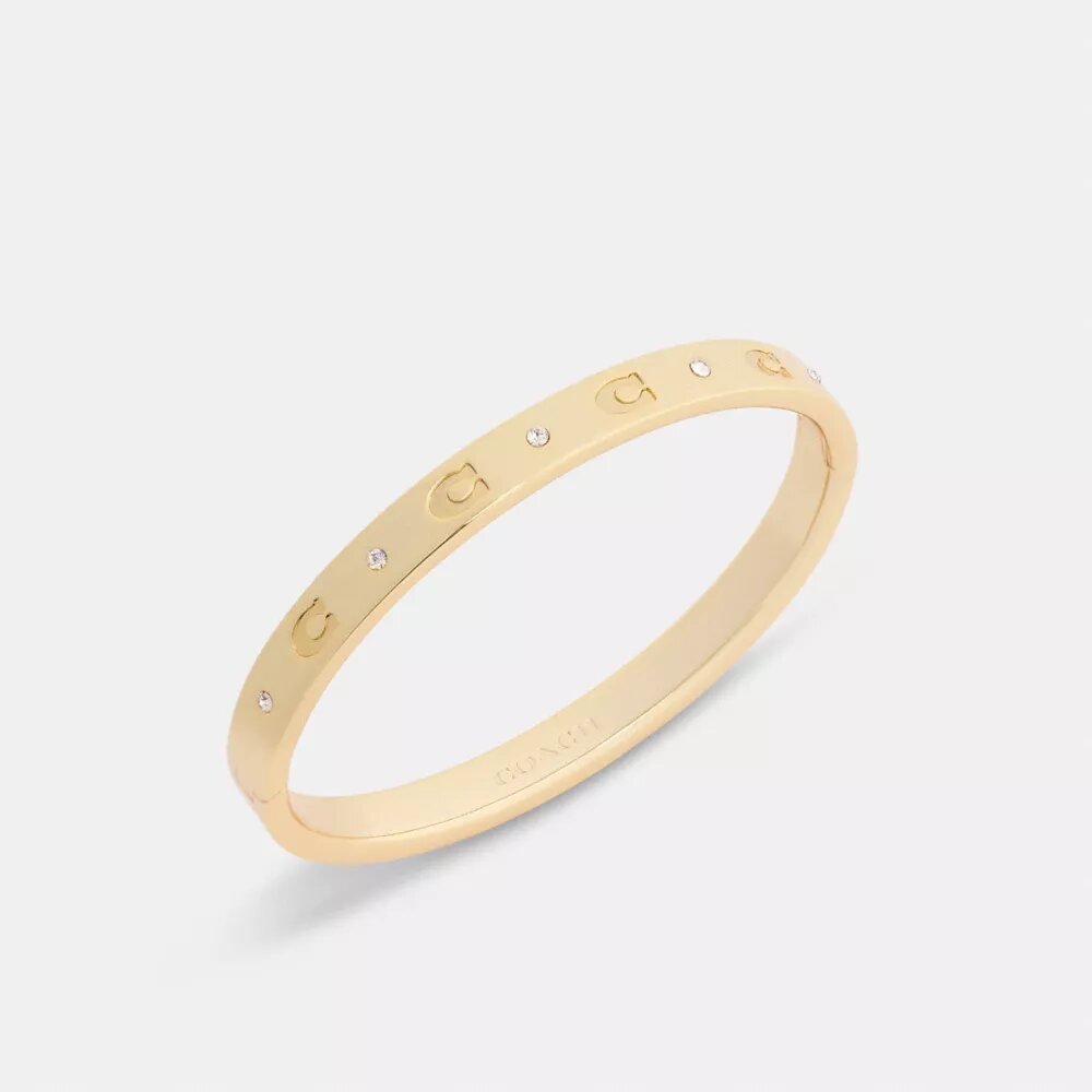 Armbånd med gentaget C-motiv og hængsel
