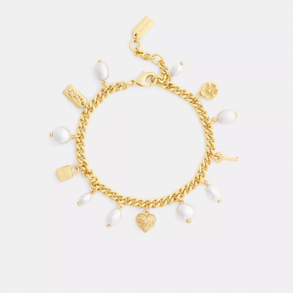 Armbånd med perle- og hjertevedhæng