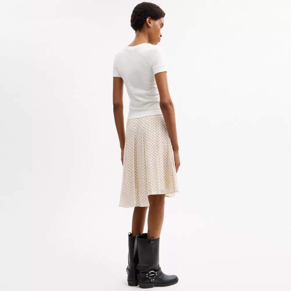 Asymmetrisk plisseret nederdel med print