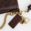 Audrey-crossbody-taske i Signature Canvas