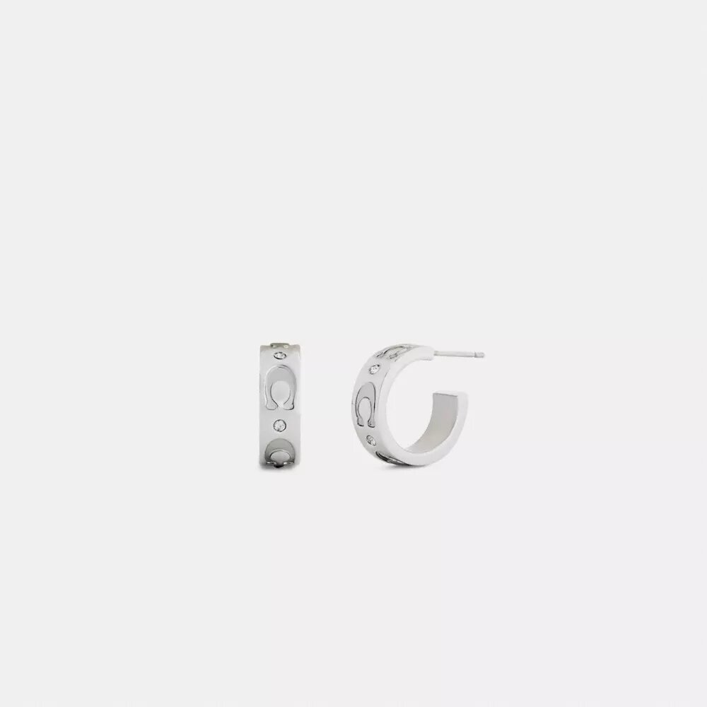 C Huggie-øreringe i gentaget design