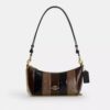 Caitlin skuldertaske med stribet patchwork