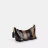 Caitlin skuldertaske med stribet patchwork