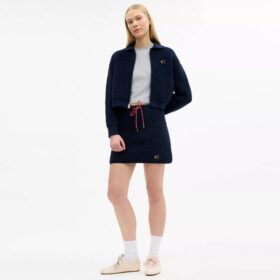 Cardigan med lynlås foran