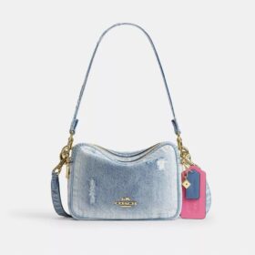 Carey crossbody-taske i Loved Denim med vedhæng