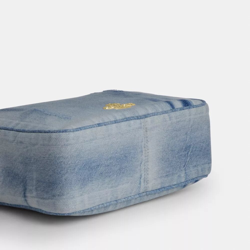 Carey crossbody-taske i Loved Denim med vedhæng