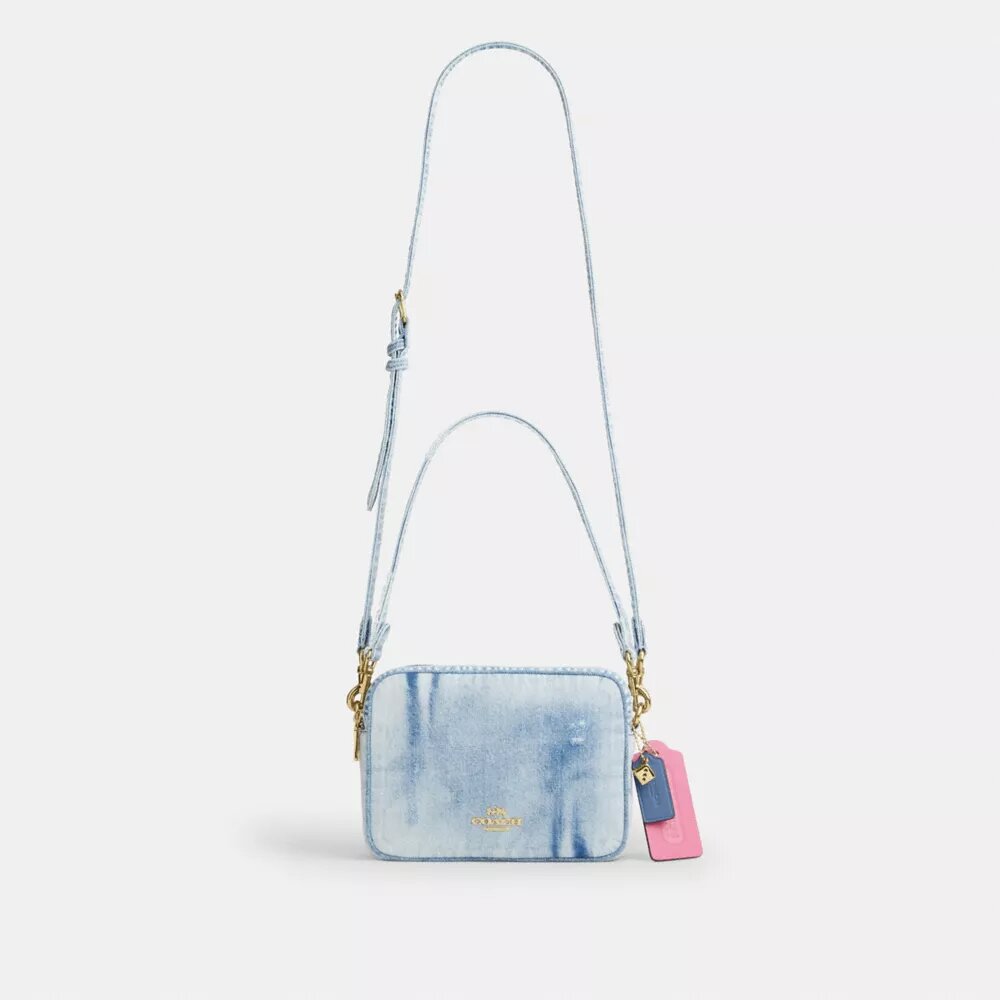 Carey crossbody-taske i Loved Denim med vedhæng