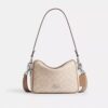 Carey-crossbody-taske i Signature Canvas
