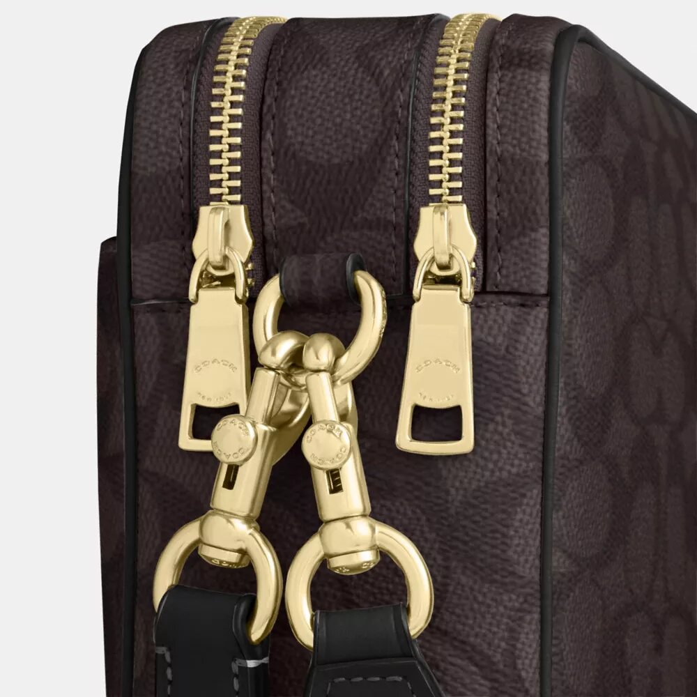 Carey-crossbody-taske i Signature Canvas