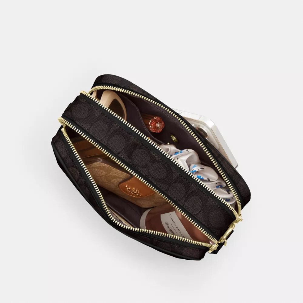 Carey-crossbody-taske i Signature Canvas