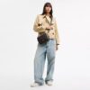 Carey-crossbody-taske i Signature Canvas