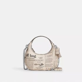 Carmen Mini-crossbody-taske med avistryk
