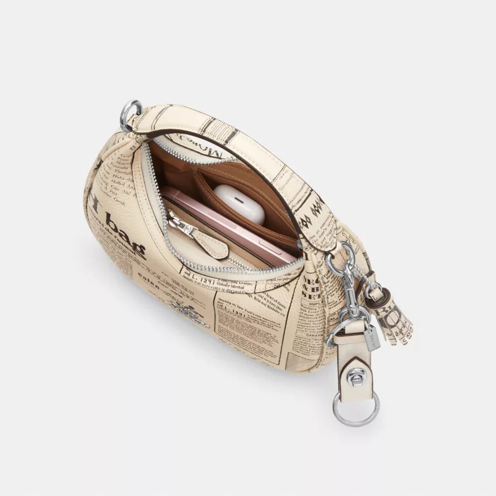 Carmen Mini-crossbody-taske med avistryk