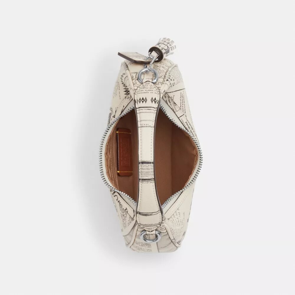 Carmen Mini-crossbody-taske med avistryk