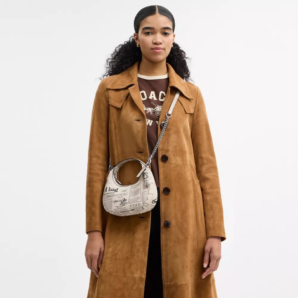 Carmen Mini-crossbody-taske med avistryk