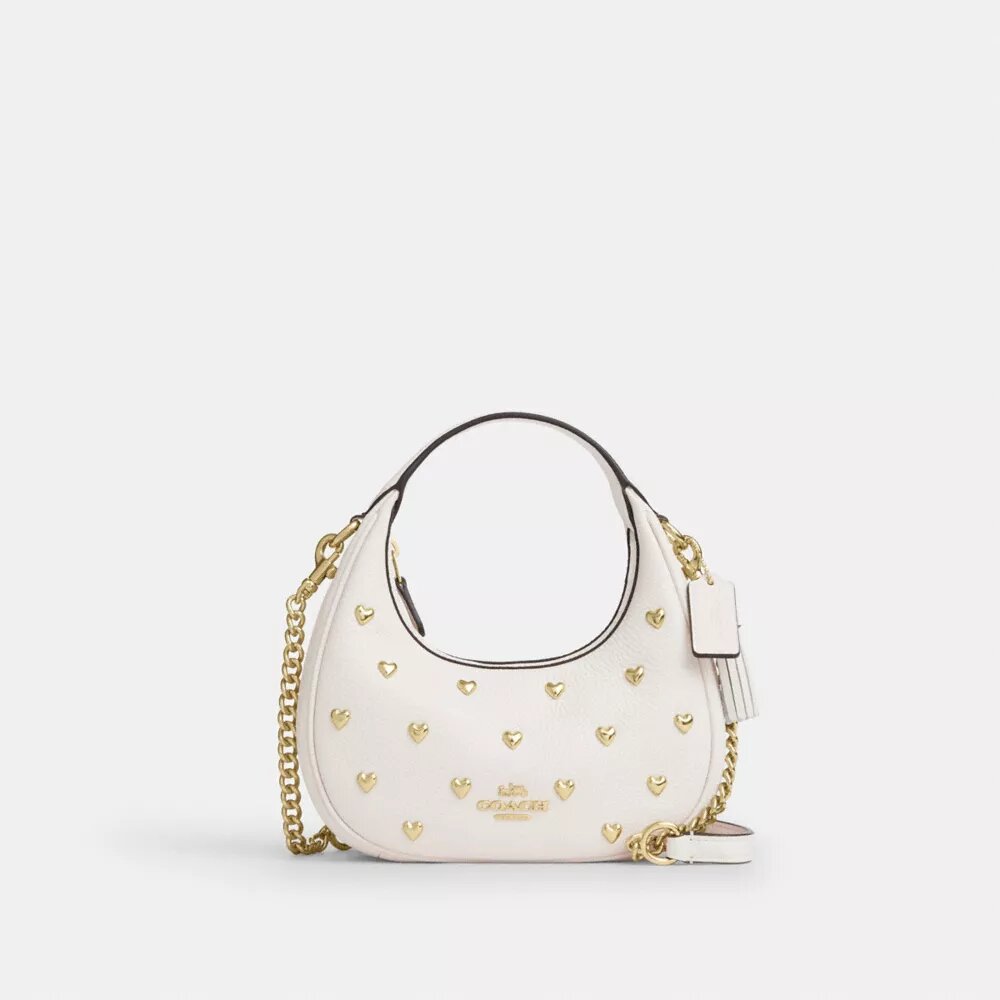Carmen Mini-crossbody-taske med hjerteformede nitter