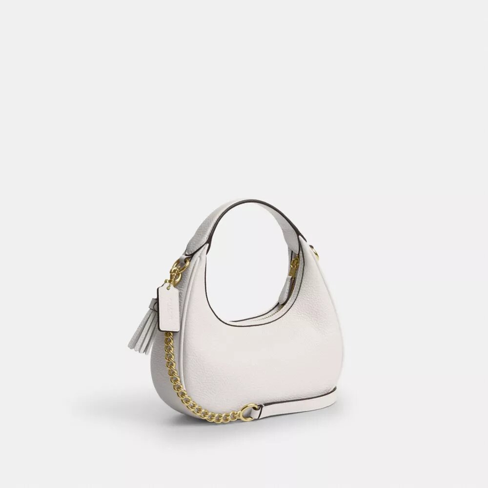 Carmen Mini-crossbody-taske med hjerteformede nitter