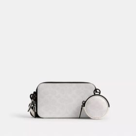 Charter Slim crossbody-taske i Signature Canvas