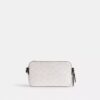 Charter Slim crossbody-taske i Signature Canvas
