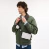 Charter Slim crossbody-taske i Signature Canvas