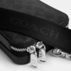 Clinton-crossbody-taske i Signature Canvas
