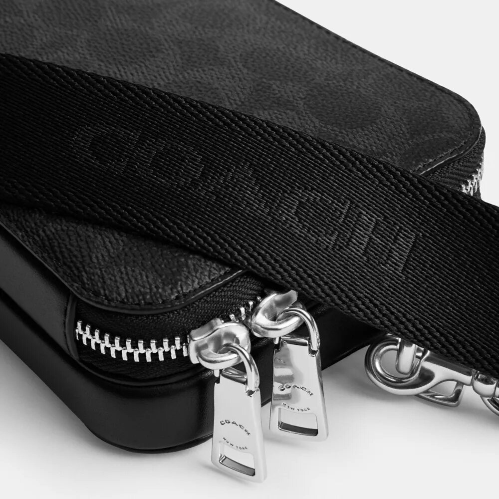 Clinton-crossbody-taske i Signature Canvas