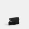 Clinton crossbody-taske med blødt grafisk motiv
