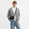 Clinton crossbody-taske med blødt grafisk motiv