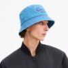 Coach Script-broderet denim-buckethat