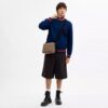 Colton crossbody-taske 25 i Signature Canvas
