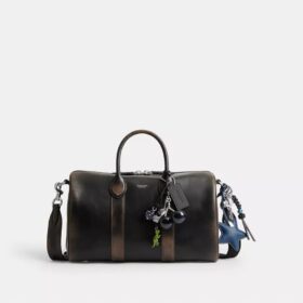 Compass Bag 35 i patineret læder med vedhæng