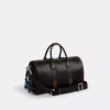 Compass Bag 35 i patineret læder med vedhæng