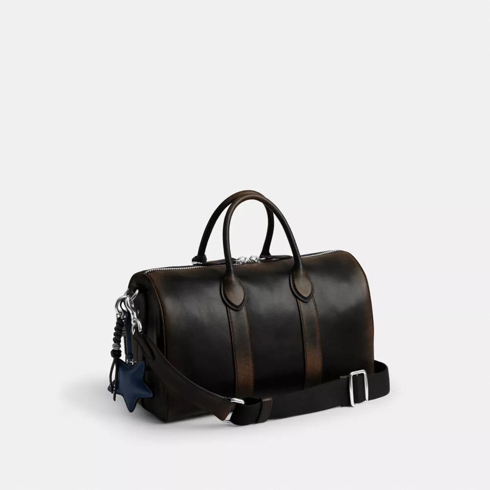 Compass Bag 35 i patineret læder med vedhæng