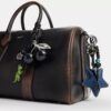 Compass Bag 35 i patineret læder med vedhæng