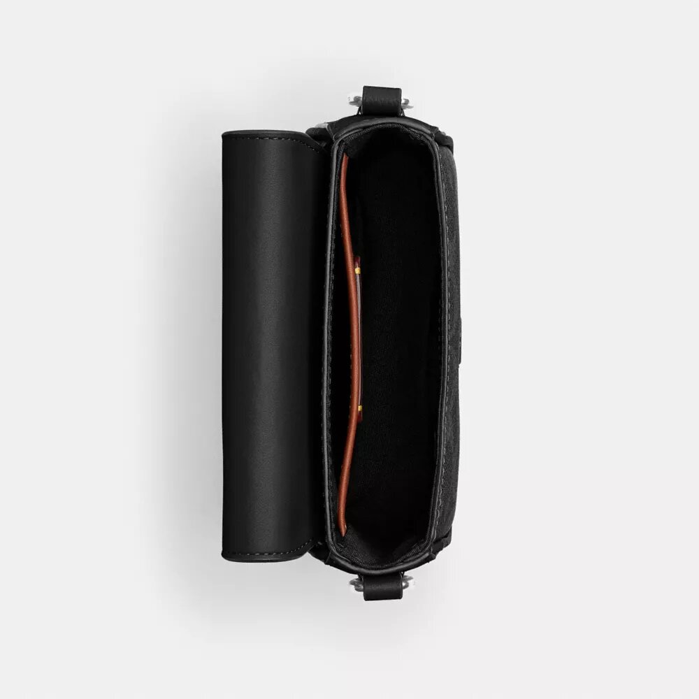 Crossbody-taske med klap i Signature Canvas