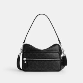 Dakota crossbody-taske i Signature Canvas