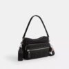 Dakota crossbody-taske i Signature Nylon