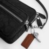 Dakota crossbody-taske i Signature Nylon