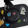 Disney X Coach Charter Slim crossbody-taske med klistermærketryk