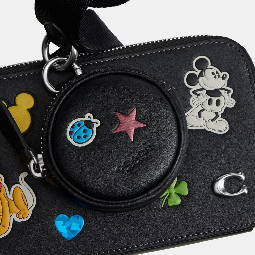 Disney X Coach Charter Slim crossbody-taske med klistermærketryk
