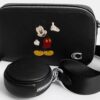 Disney X Coach Charter Slim crossbody-taske med Mickey Mouse
