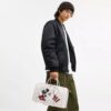 Disney X Coach Compass-taske 35 med Mickey Mouse