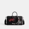 Disney X Coach Compass-taske 35 med Pluto