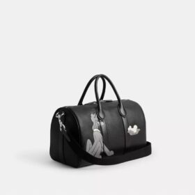 Disney X Coach Compass-taske 35 med Pluto