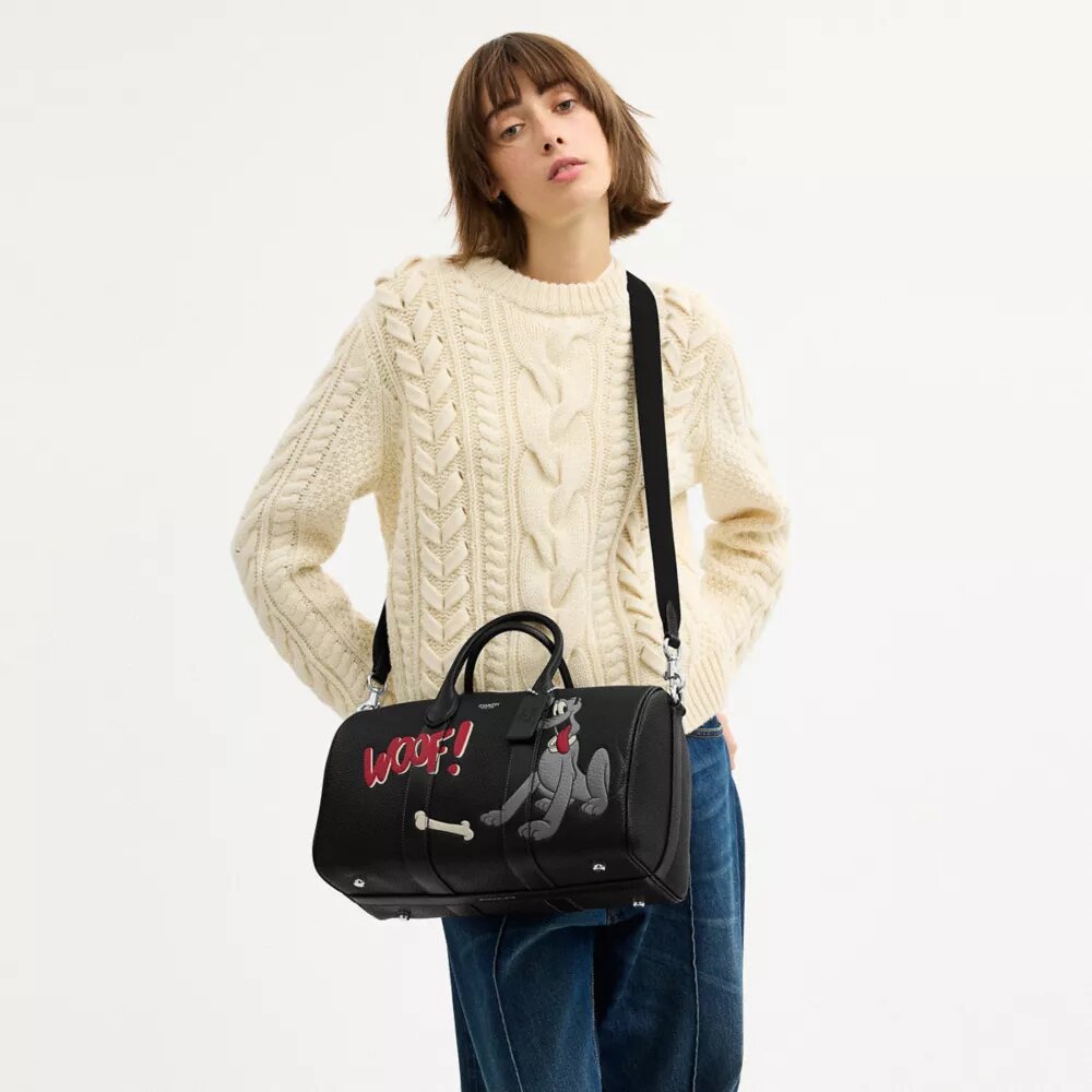 Disney X Coach Compass-taske 35 med Pluto