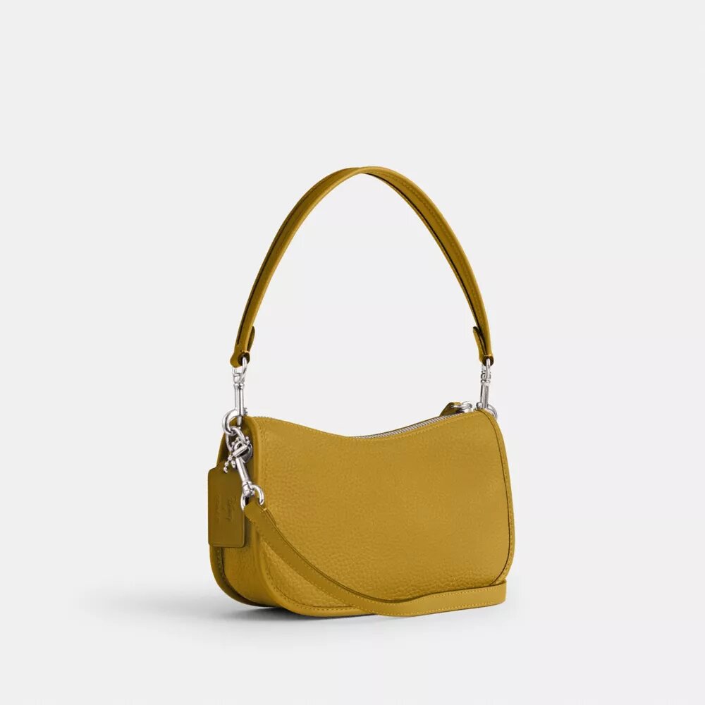 Disney X Coach Swinger-taske i regenereret læder med Mickey Mouse og venner
