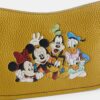 Disney X Coach Swinger-taske i regenereret læder med Mickey Mouse og venner